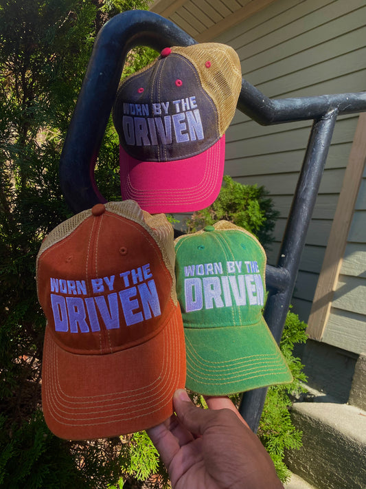 “Worn By The Driven” Trucker Hats”